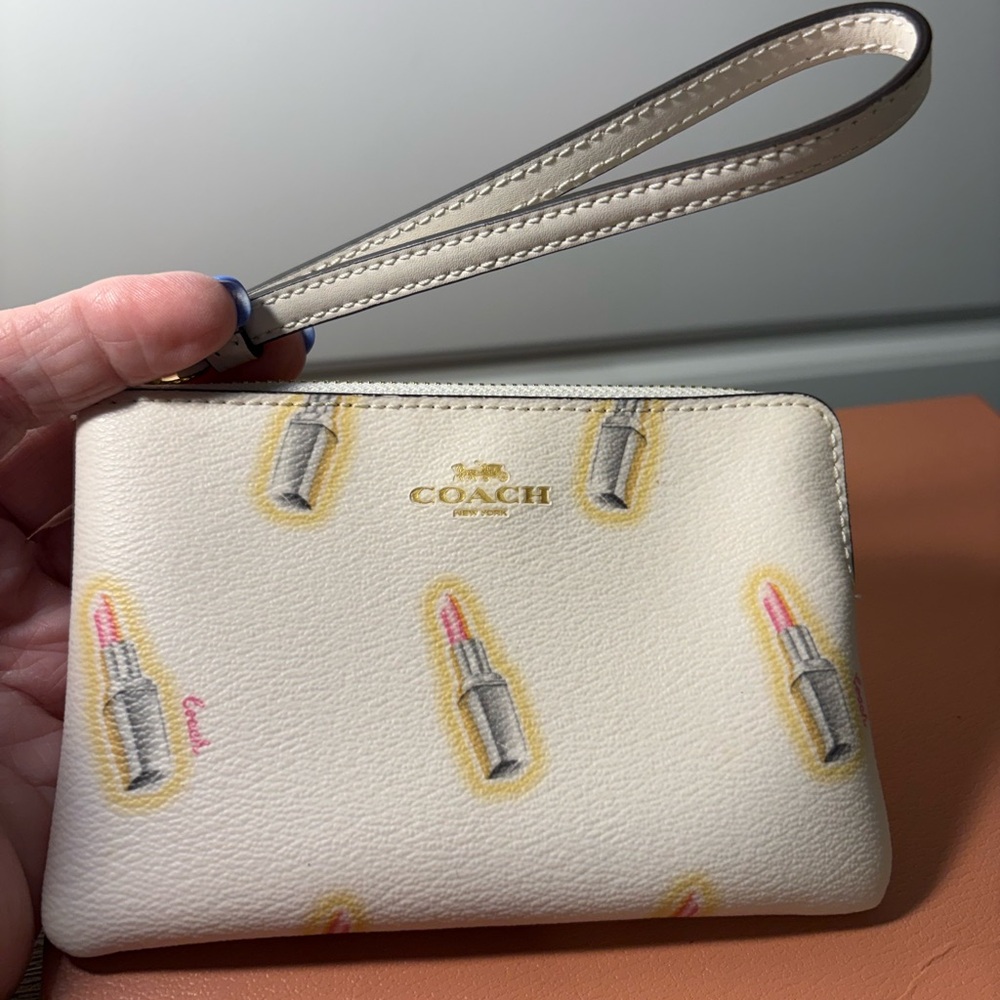 Coach Cream Leather Wristlet with Lipstick Motif